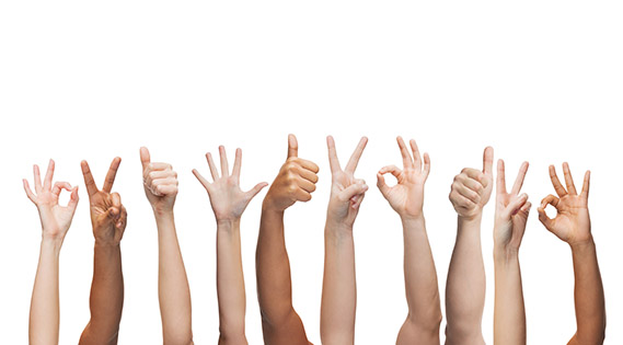 human hands showing thumbs up, ok and peace signs MG不朽情缘(中国区)官方网站